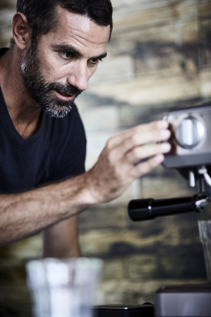 David Coleman adjusting espresso machine