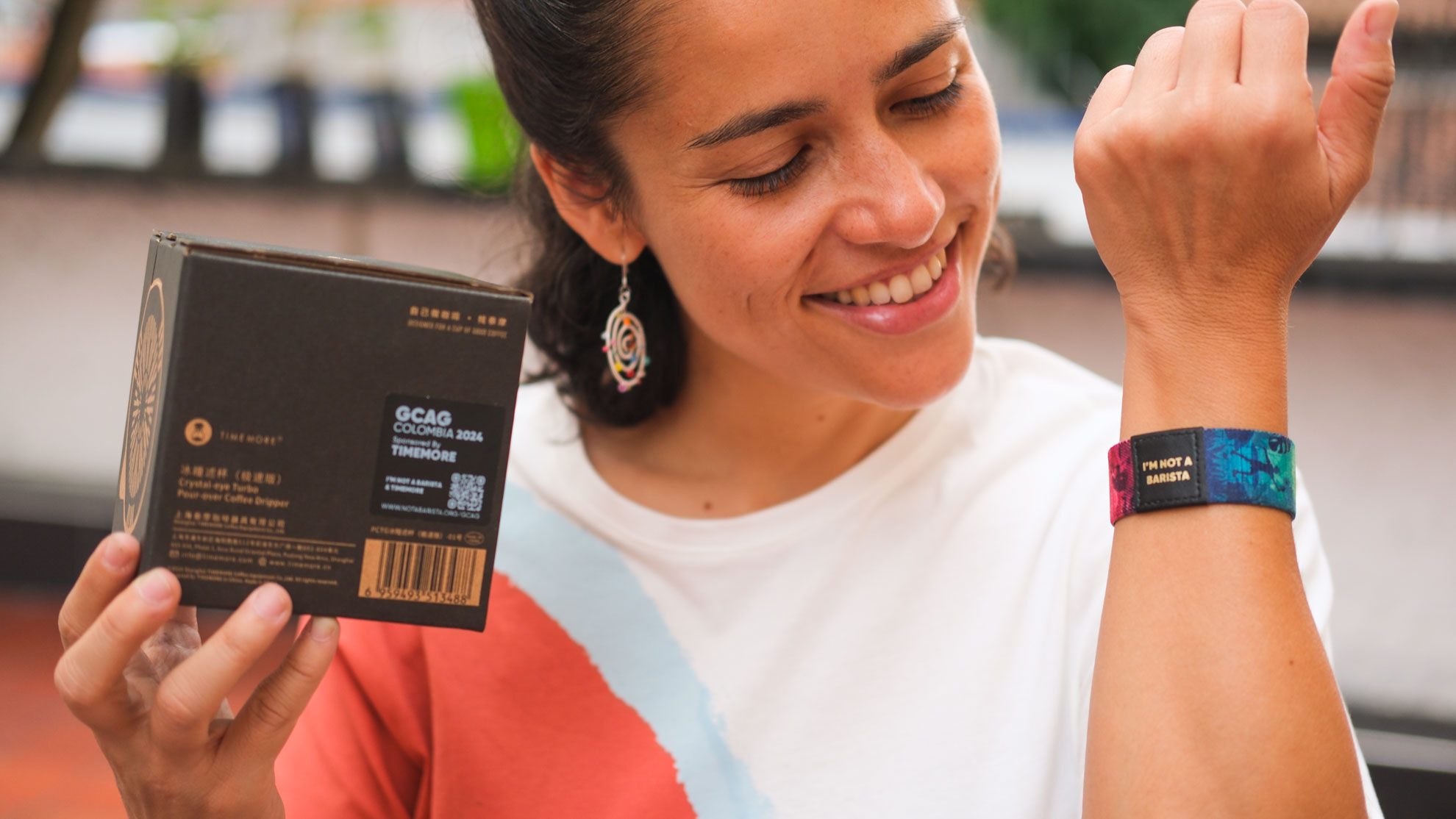 Maria Lucia with GCAG sponsored coffee tools from TIMEMORE Lilydrip and I'M NOT A BARISTA Wristbands 3